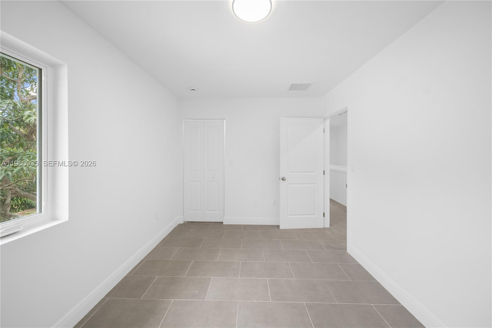 529 Northwest 56th Street Miami, FL 33127 - Photo 57 of 66 a view of an empty room