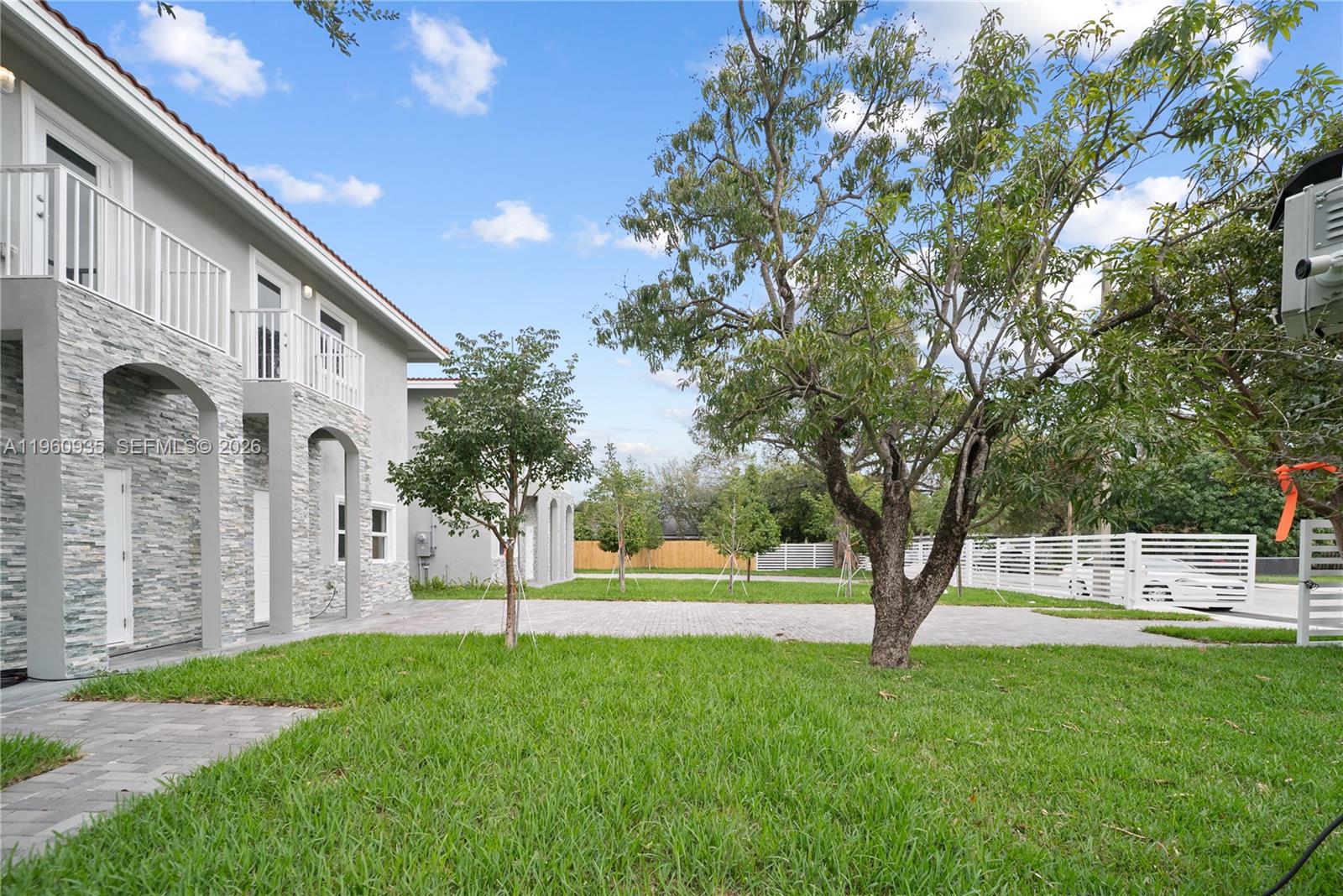 529 Northwest 56th Street Miami, FL 33127 - Photo 10 of 66 a view of yard with tree