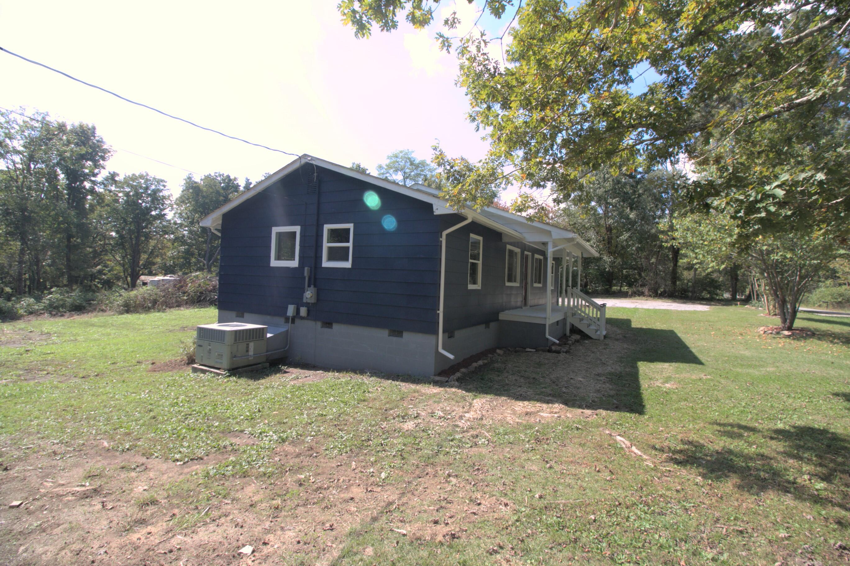273 Flat Mountain Road Dunlap, TN 37327 - Photo 4 of 27 side left
