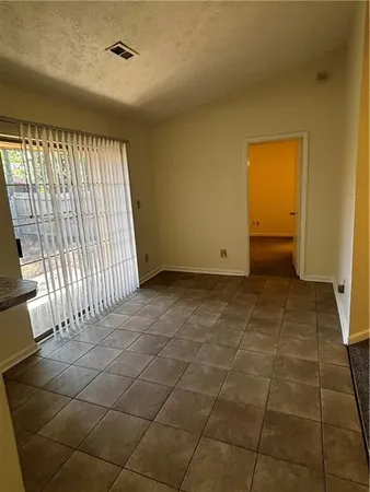 a view of a kitchen with a sink