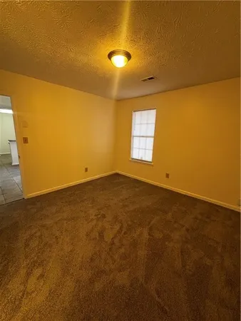 a bathroom with a sink a mirror and a toilet
