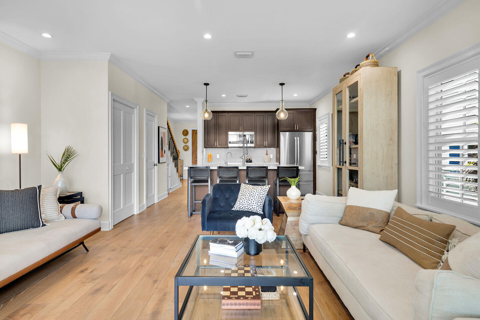 205 Virginia Street Key West, FL 33040 - Photo 16 of 41 a living room with furniture and a wooden floor