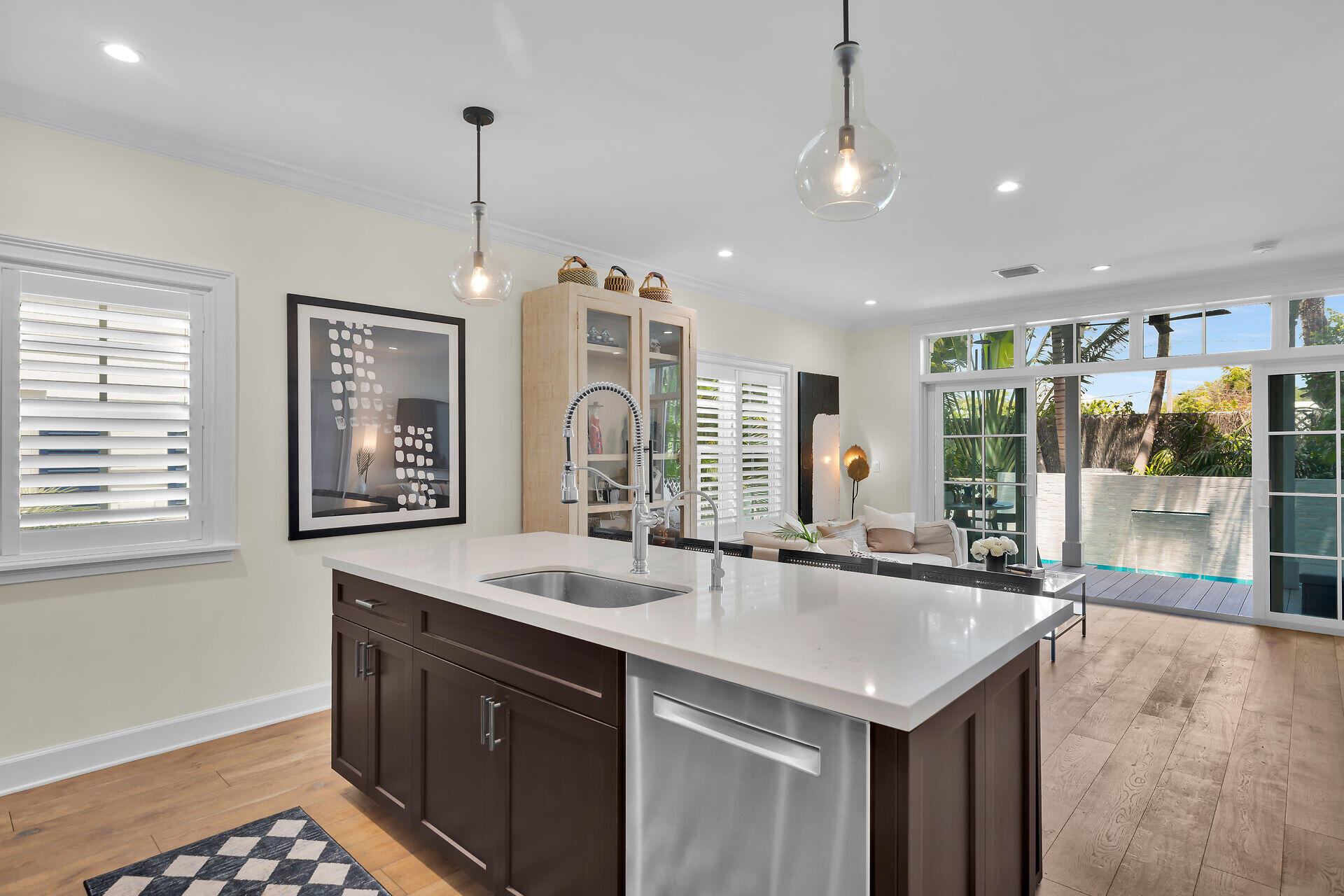 205 Virginia Street Key West, FL 33040 - Photo 18 of 41 a kitchen with a sink and a window