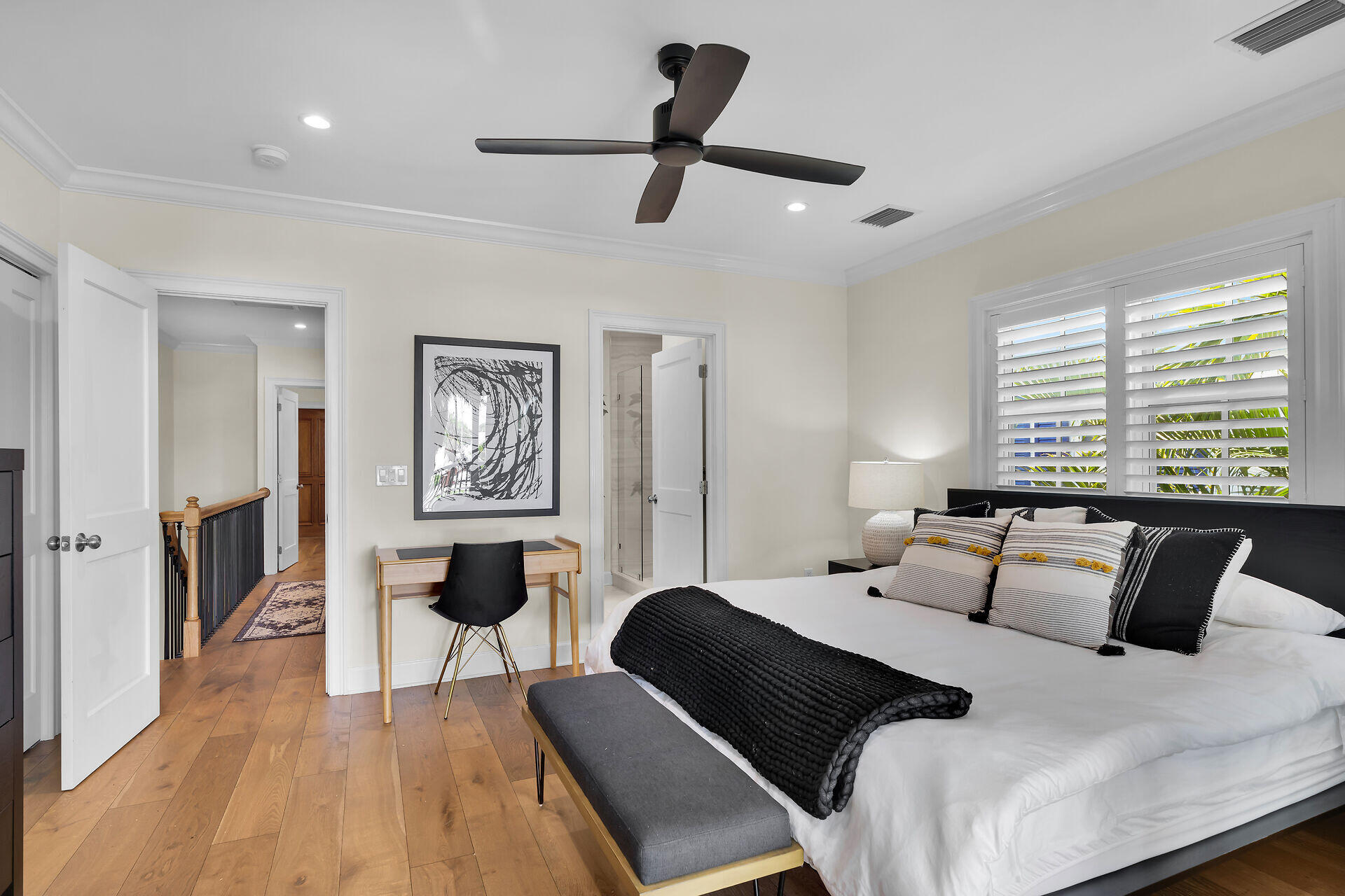 205 Virginia Street Key West, FL 33040 - Photo 26 of 41 a bedroom with a bed a couch and a window