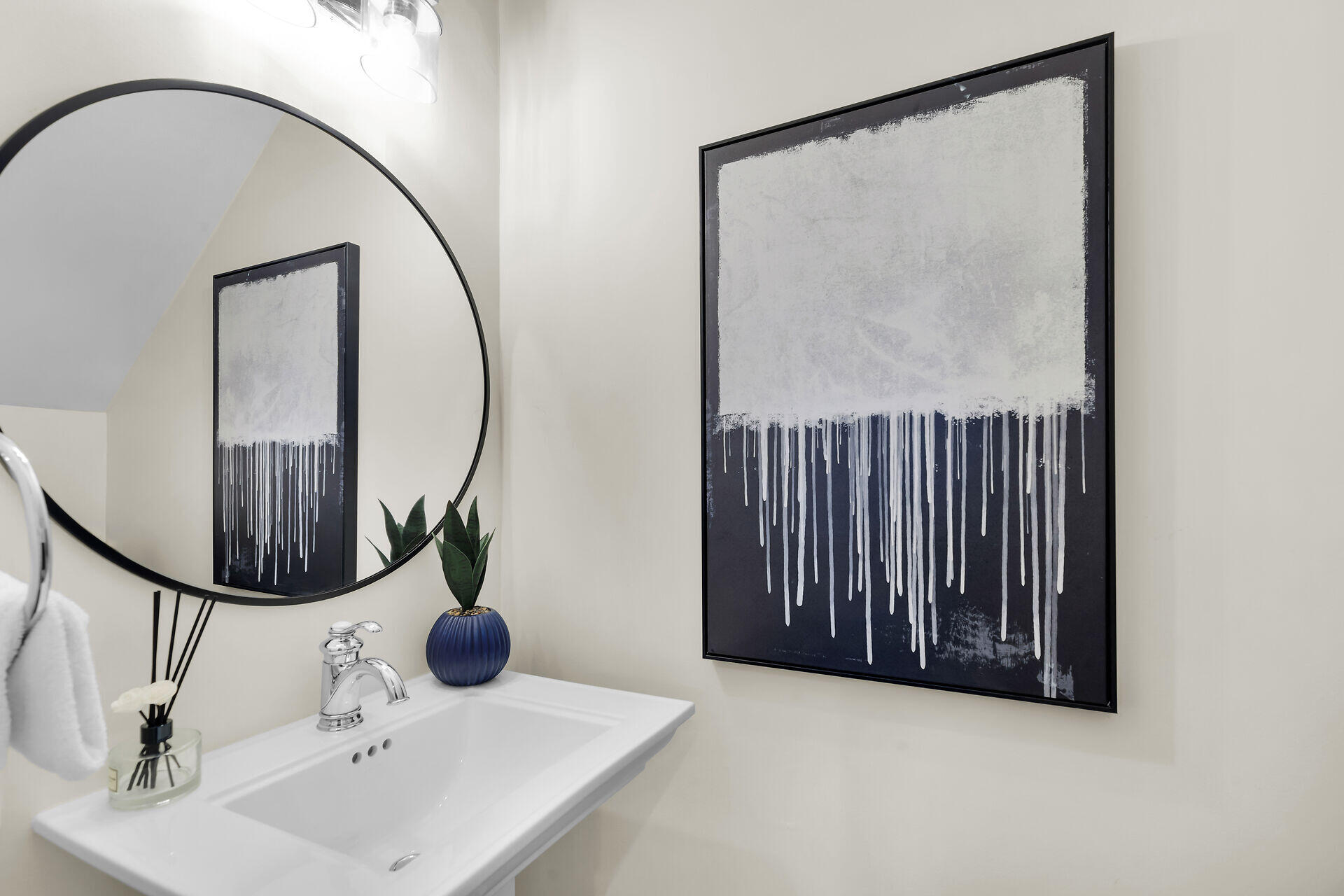 205 Virginia Street Key West, FL 33040 - Photo 30 of 41 a bathroom with a sink and a mirror