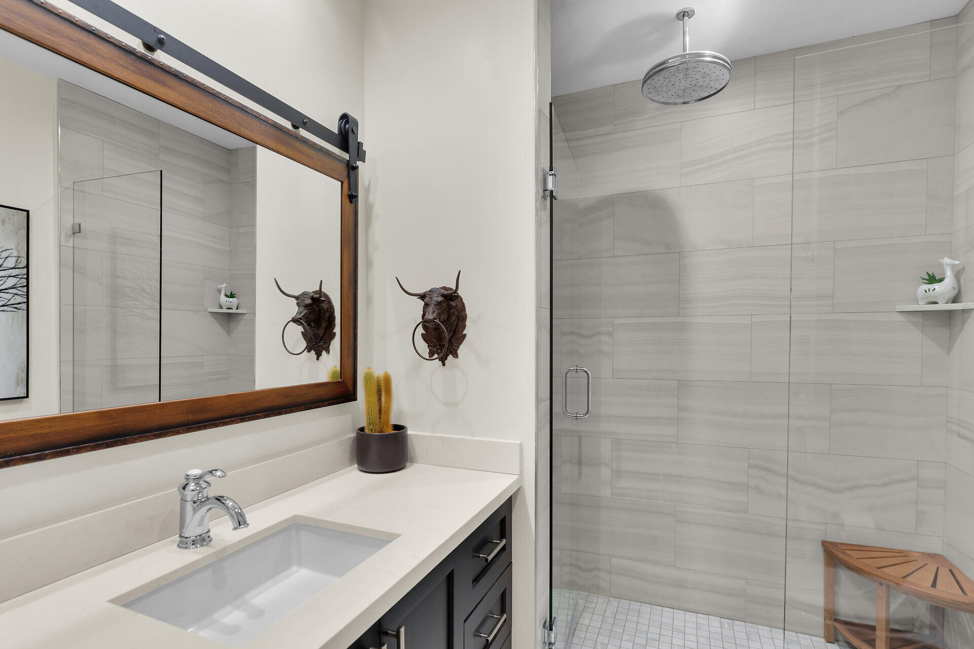 205 Virginia Street Key West, FL 33040 - Photo 31 of 41 a bathroom with a sink and a mirror