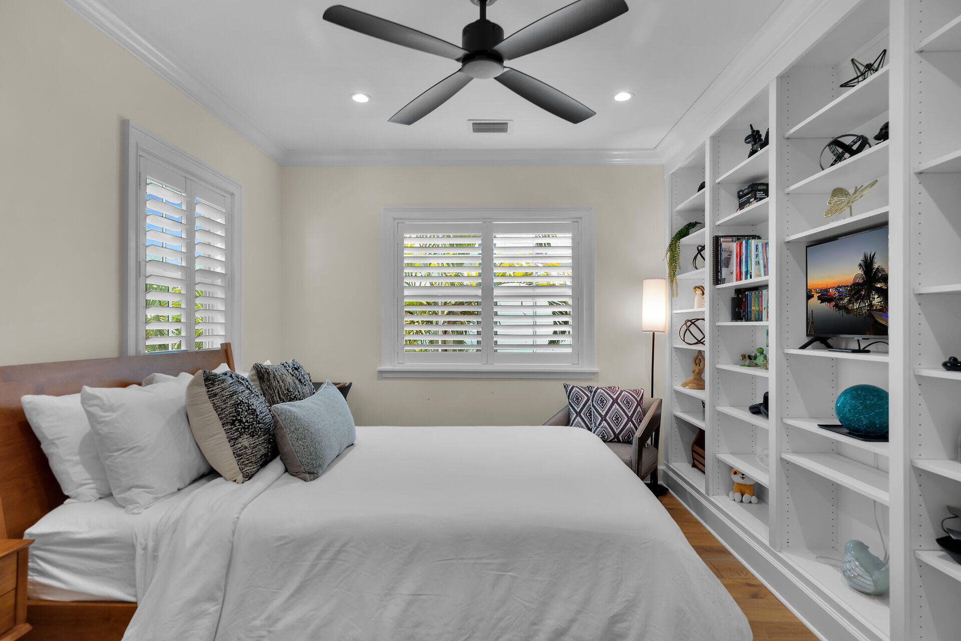 205 Virginia Street Key West, FL 33040 - Photo 36 of 41 a bedroom with a large bed and a window