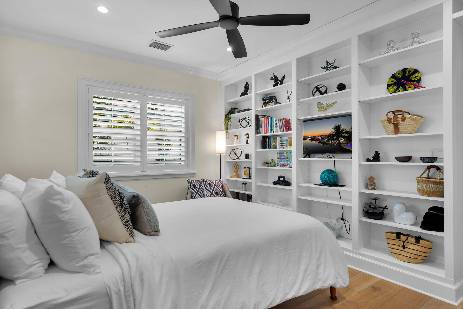 205 Virginia Street Key West, FL 33040 - Photo 37 of 41 a bedroom with a large bed and a window