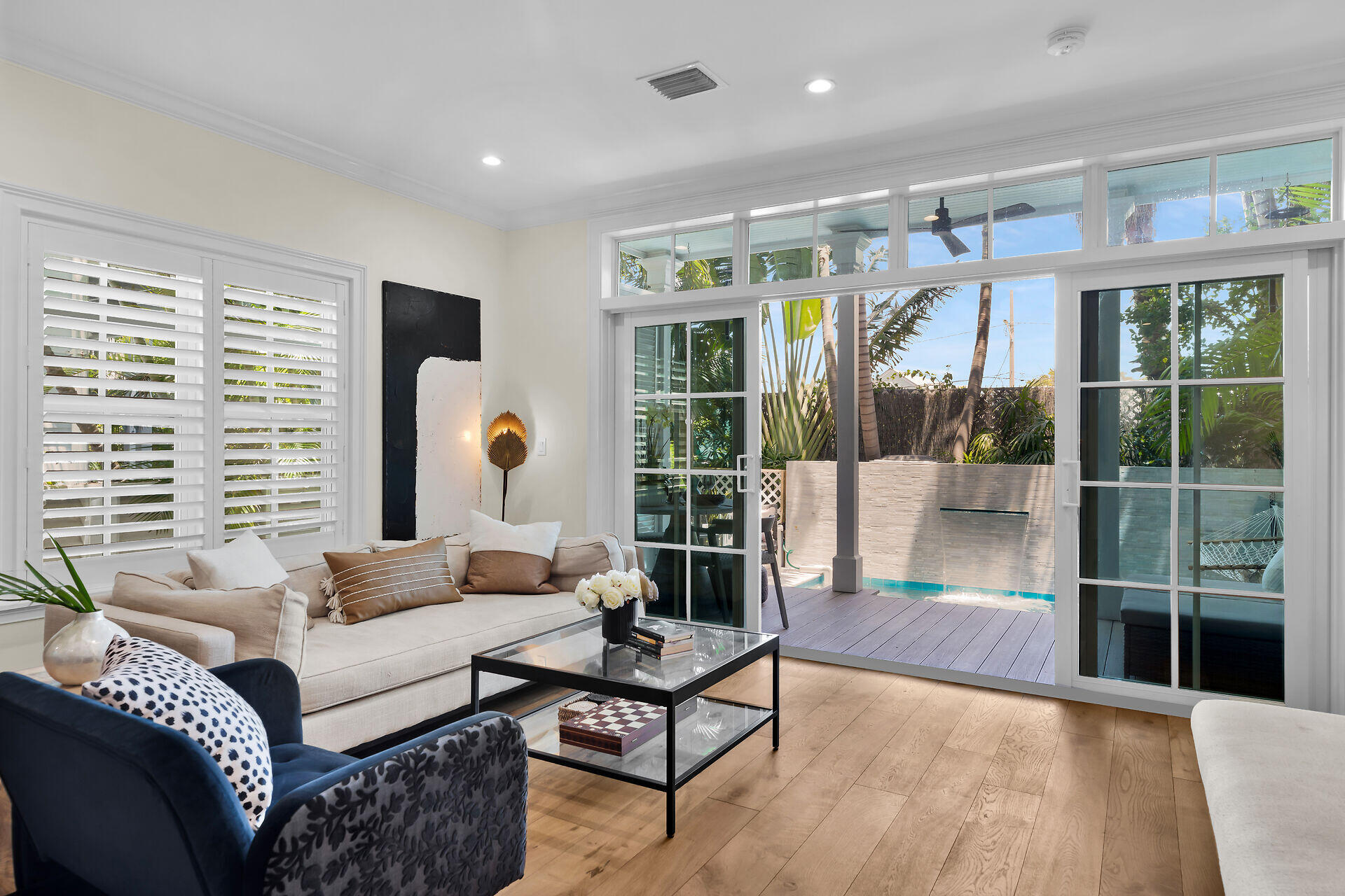 205 Virginia Street Key West, FL 33040 - Photo 9 of 41 a living room with furniture and a large window