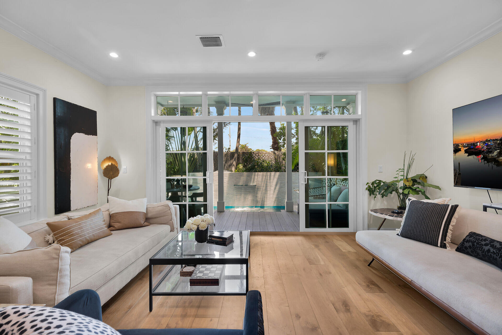 205 Virginia Street Key West, FL 33040 - Photo 10 of 41 a living room with furniture and a large window