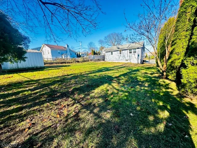 a swimming pool with outdoor seating