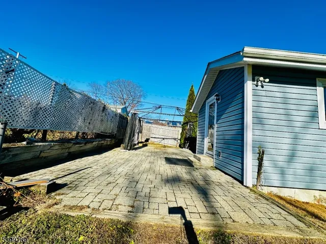 a view of a backyard of the house
