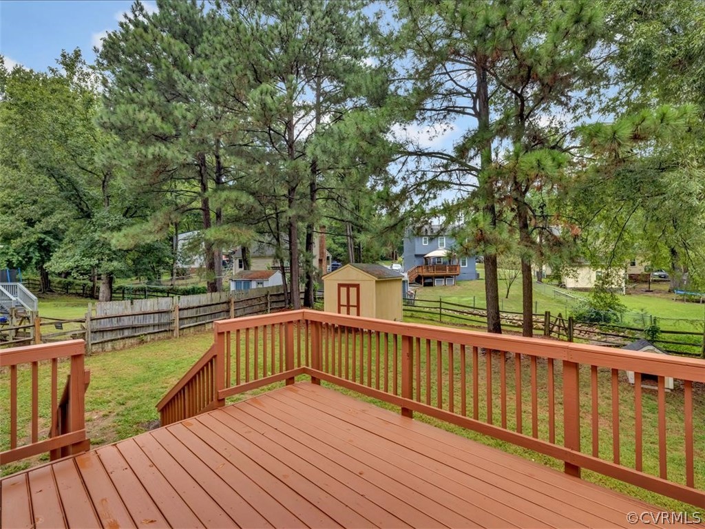 12402 South Ridge Circle Midlothian, VA 23112 - Photo 15 of 16 a view of balcony with wooden floor and fence