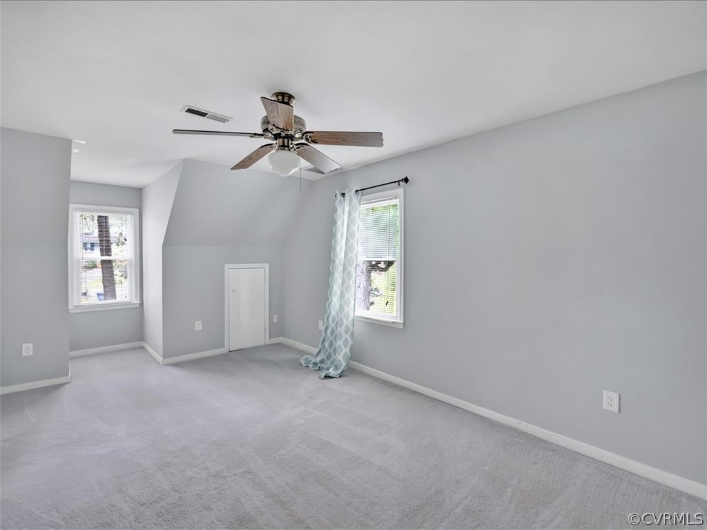 12402 South Ridge Circle Midlothian, VA 23112 - Photo 10 of 16 a view of a livingroom with a ceiling fan and window