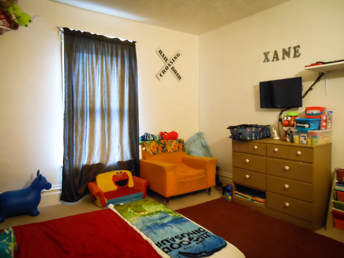 203 5th Avenue Rochelle, IL 61068 - Photo 15 of 25 a bedroom with two beds and a chandelier