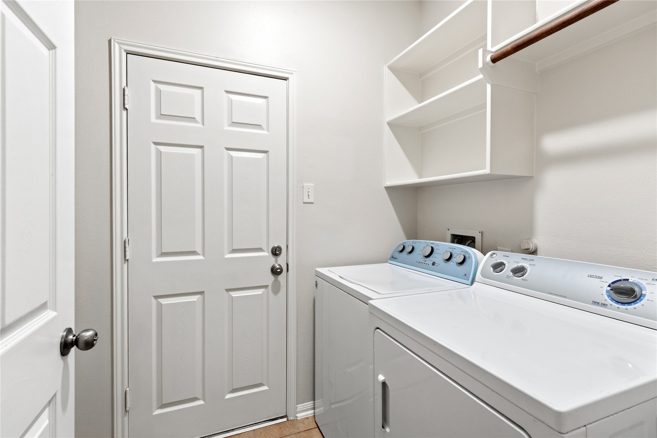 6211 Stone Hill Road Spring, TX 77389 - Photo 39 of 43 a utility room with dryer and washer