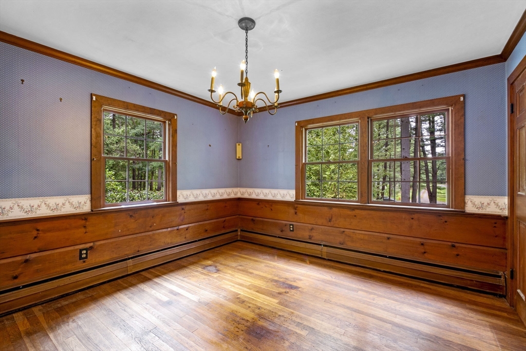 20 Main Street Boxford, MA 01921 - Photo 14 of 40 a view of room with window and ceiling fan