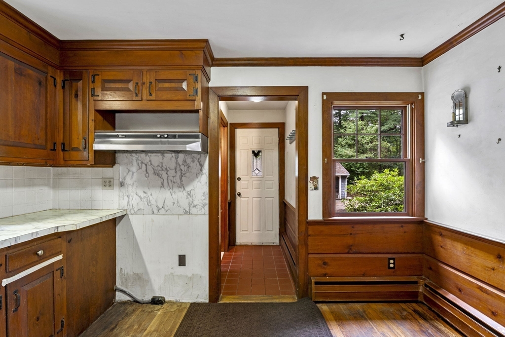 20 Main Street Boxford, MA 01921 - Photo 18 of 40 a kitchen with a refrigerator and a sink