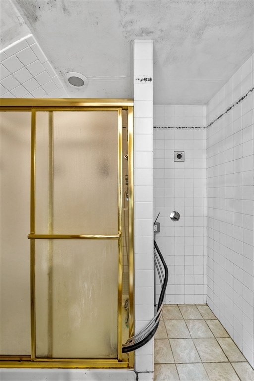 20 Main Street Boxford, MA 01921 - Photo 20 of 40 a bathroom with a shower and a mirror