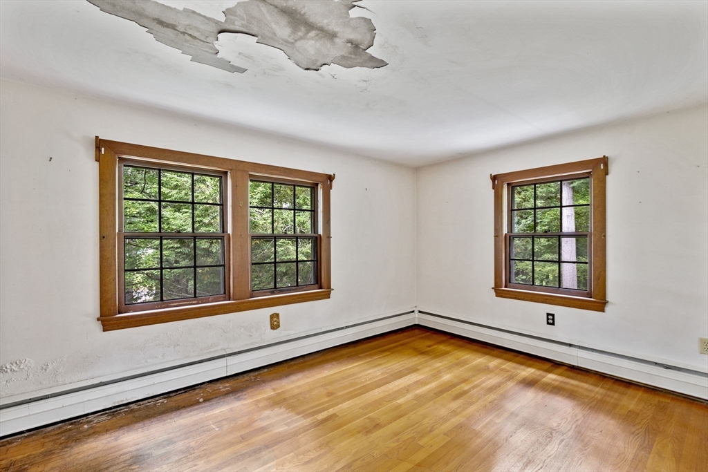 20 Main Street Boxford, MA 01921 - Photo 27 of 40 a view of an empty room with a window