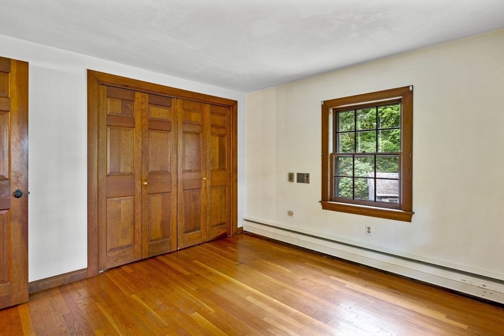 20 Main Street Boxford, MA 01921 - Photo 29 of 40 an empty room with window