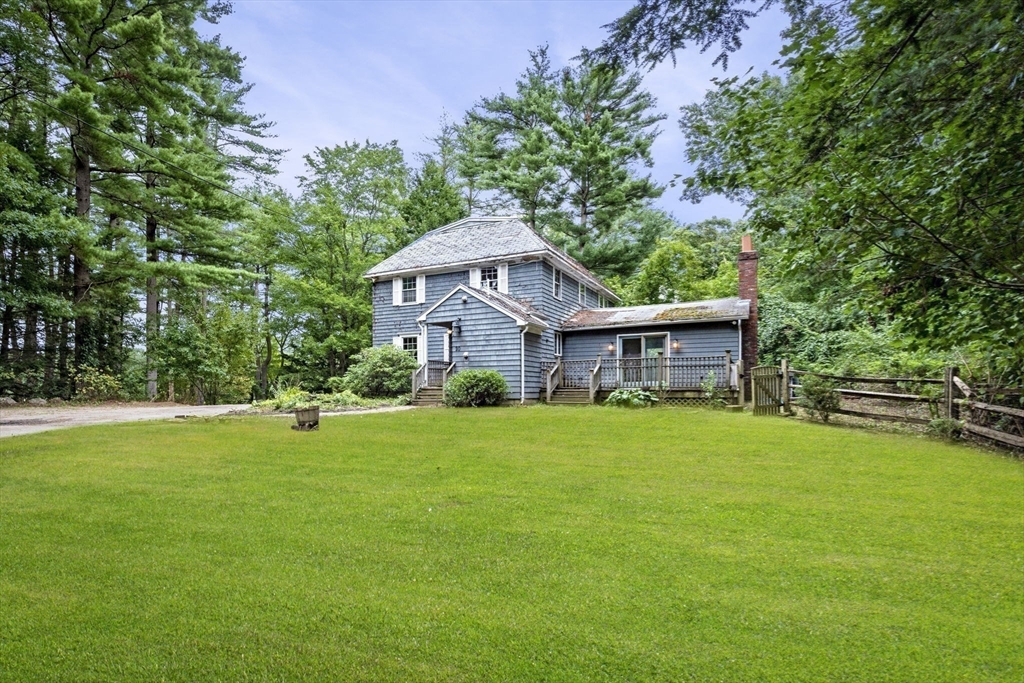 20 Main Street Boxford, MA 01921 - Photo 34 of 40 a front view of a house with garden