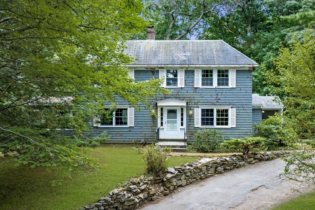 20 Main Street Boxford, MA 01921 - Photo 6 of 40 a house that has a lot of plants in it