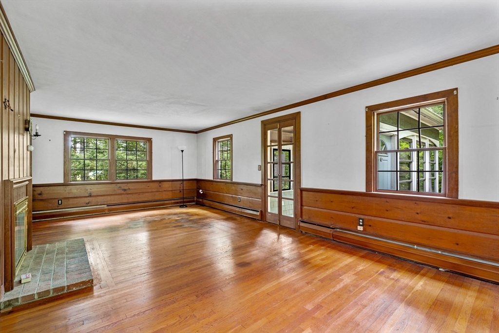 20 Main Street Boxford, MA 01921 - Photo 10 of 40 a view of empty room with wooden floor and fan