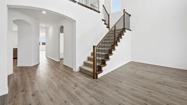 a view of entryway with wooden floor