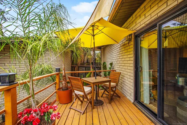 a bedroom with furniture and wooden floor