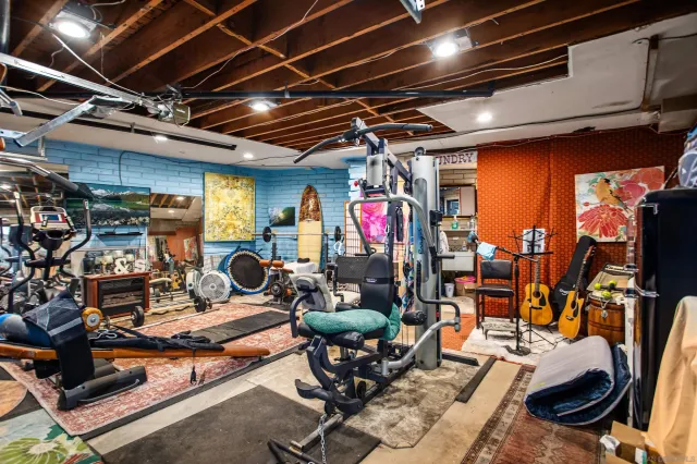 a view of a balcony with a tree