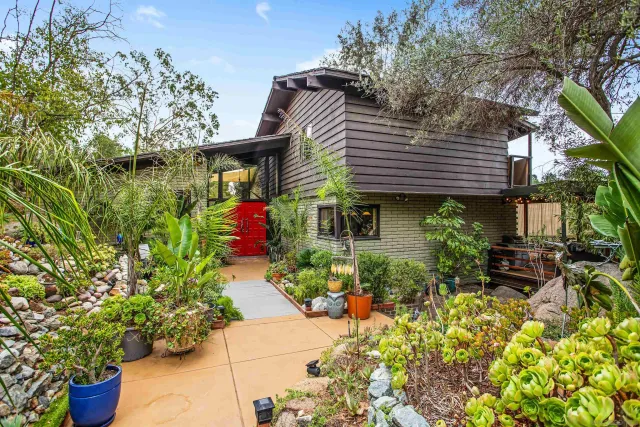 a front view of a house with a porch