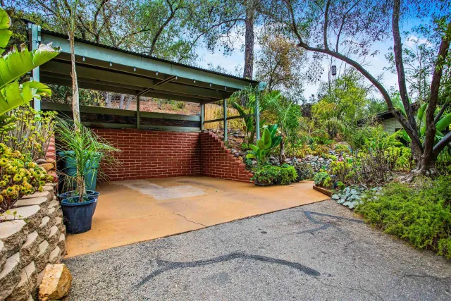 a view of two chairs on the roof deck