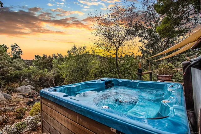 a pathway of a house with a yard