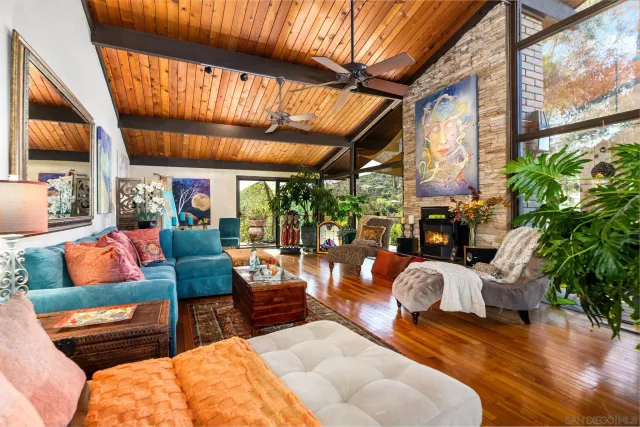 a dining room with furniture window and outdoor view
