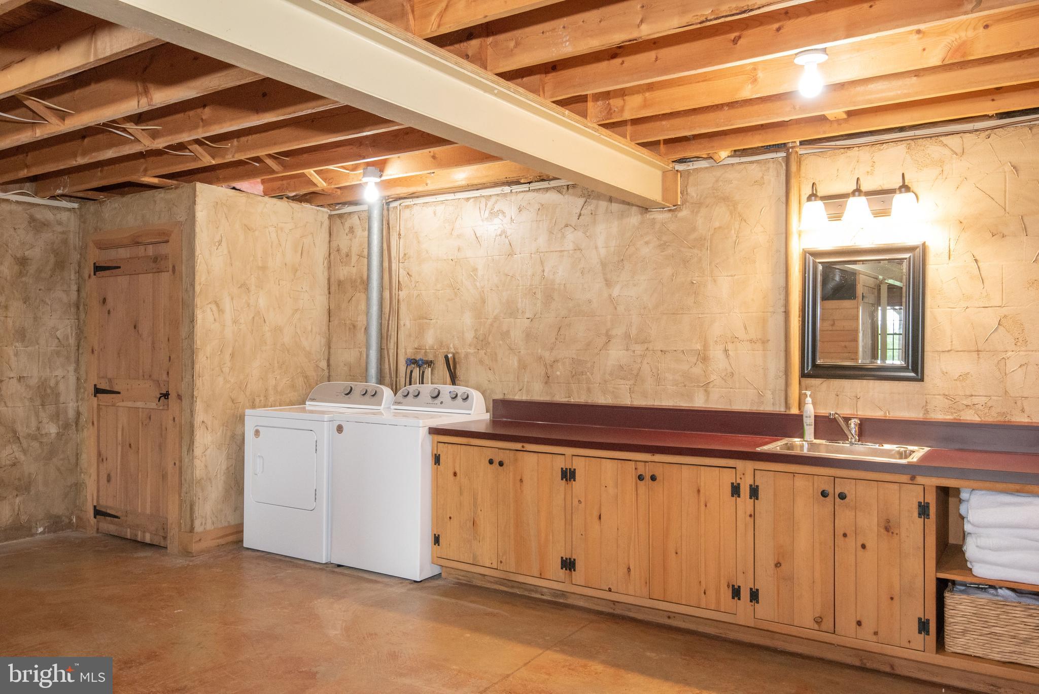 300 Beegle Road Everett, PA 15537 - Photo 15 of 114 a view of a bathroom with a sink and a mirror