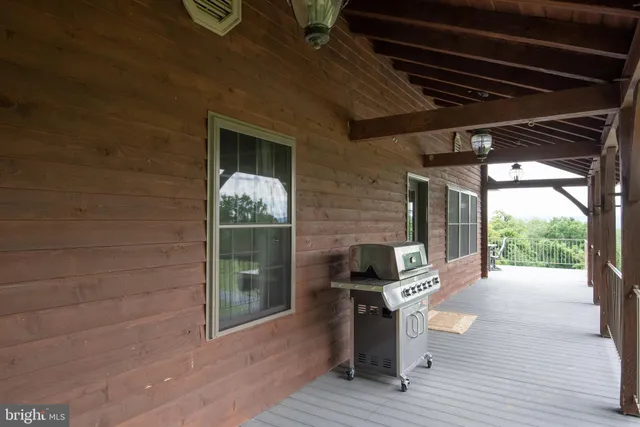 a view of a terrace with a yard