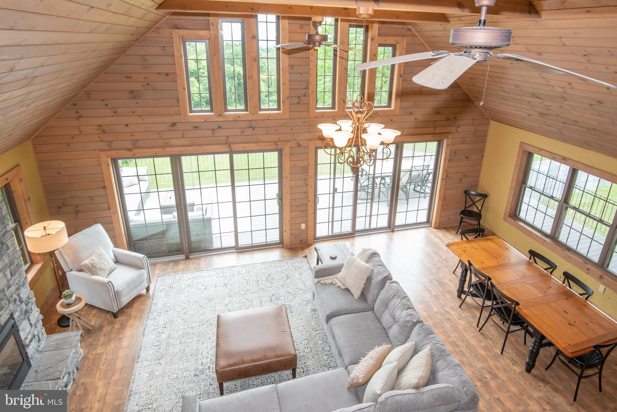 300 Beegle Road Everett, PA 15537 - Photo 33 of 114 a living room with furniture and a large window