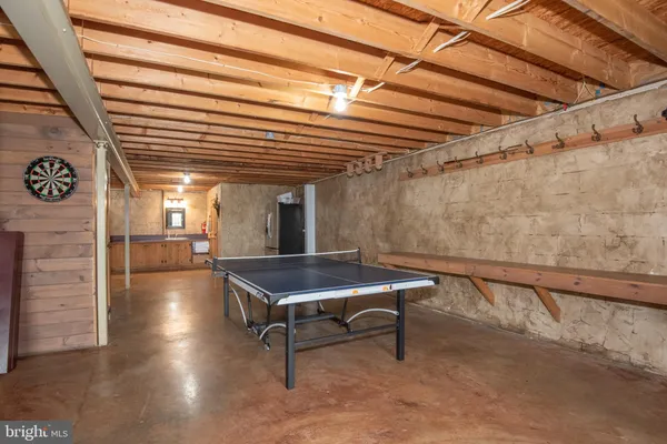 a view of a dry yard with trees