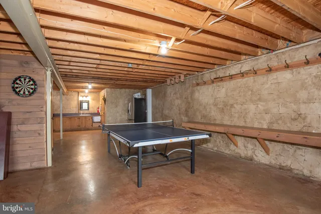 a view of a dry yard with trees
