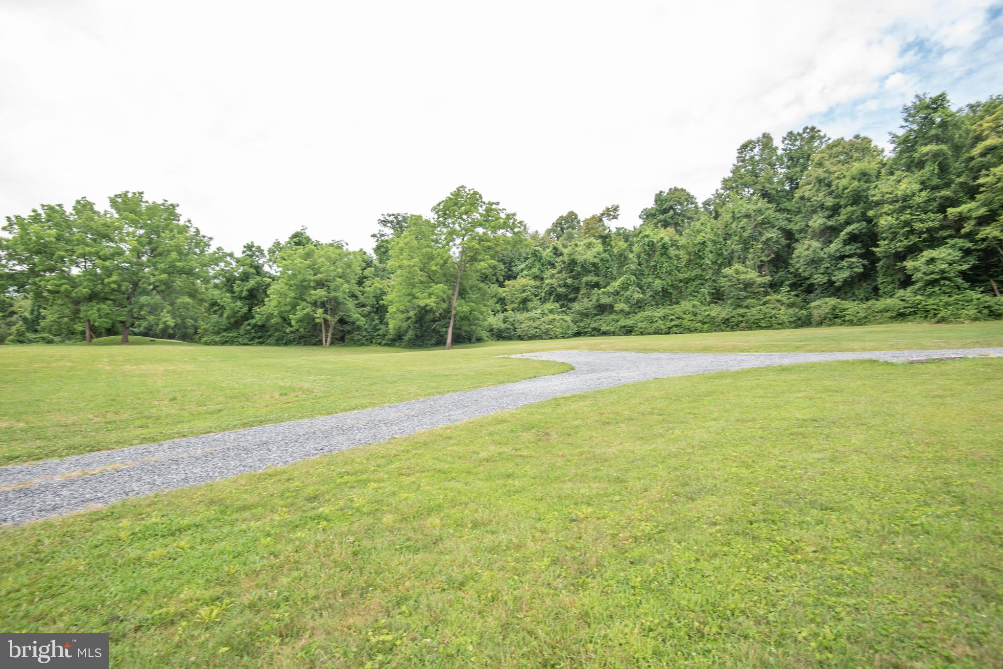 300 Beegle Road Everett, PA 15537 - Photo 63 of 114 a view of a green field with trees in the background