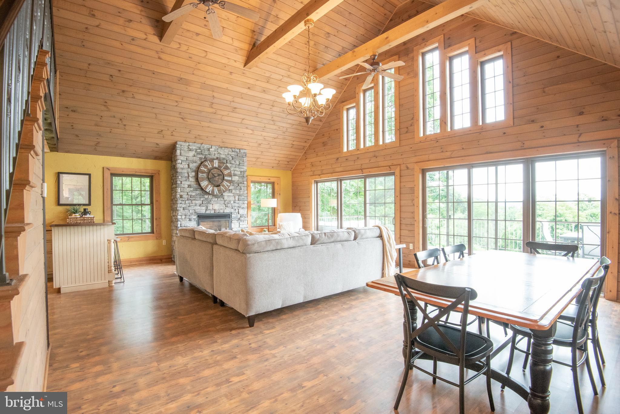 300 Beegle Road Everett, PA 15537 - Photo 8 of 114 a dining room with furniture and wooden floor