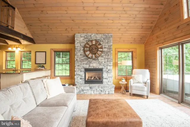 a kitchen with stainless steel appliances a stove a refrigerator and cabinets