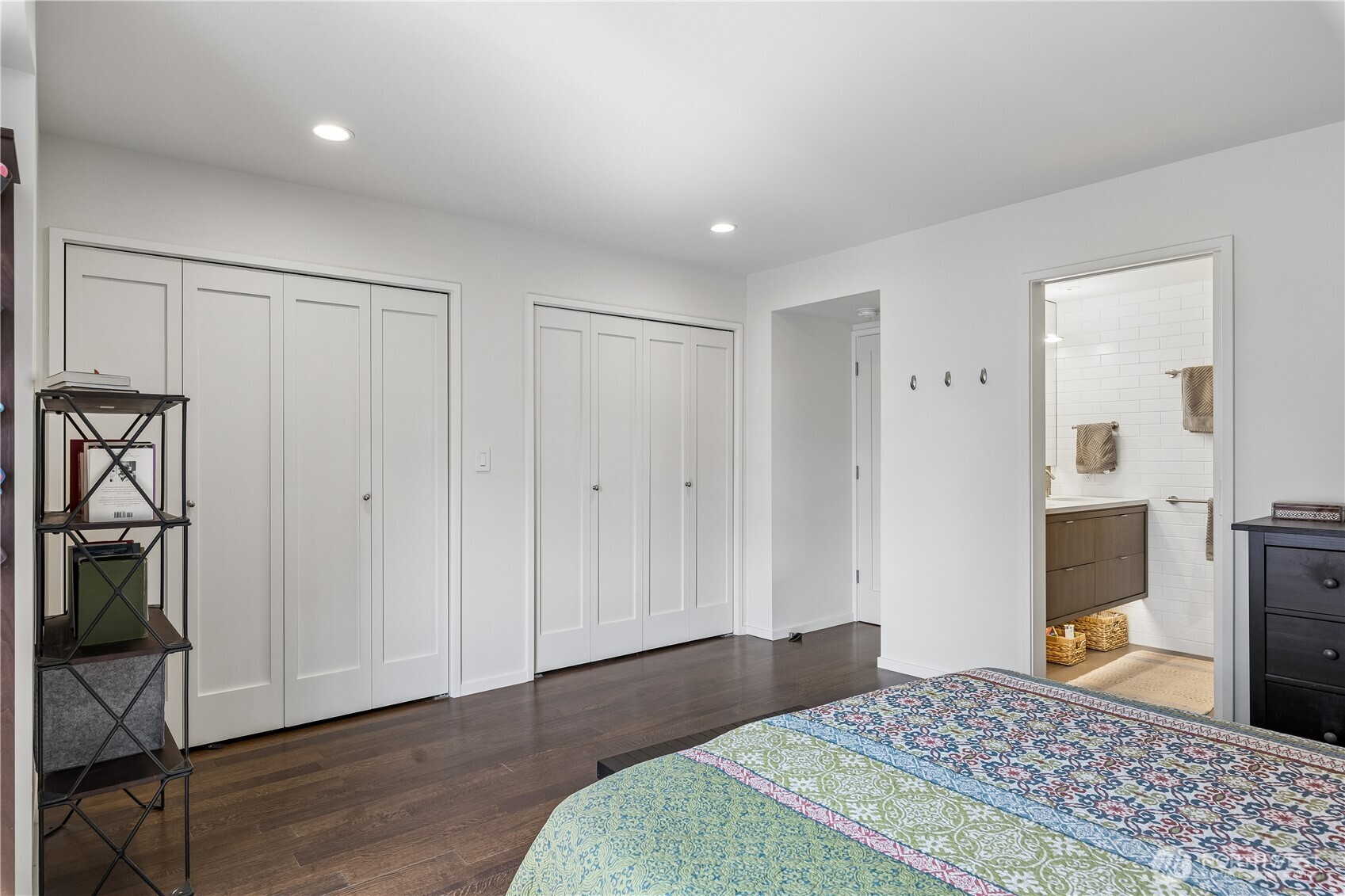 88 Virginia Street, Unit 2 Seattle, WA 98121 - Photo 14 of 20 a bedroom with a bed and a flat screen tv