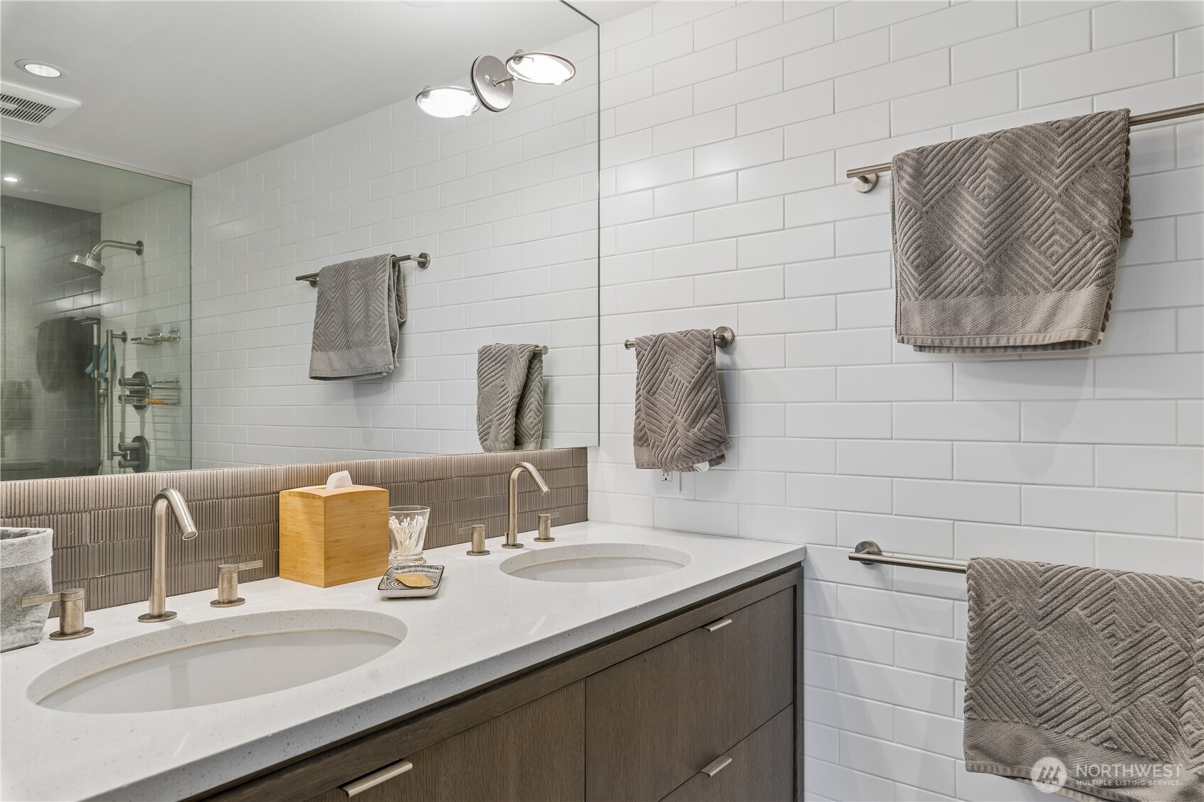 88 Virginia Street, Unit 2 Seattle, WA 98121 - Photo 17 of 20 a bathroom with a sink and a mirror