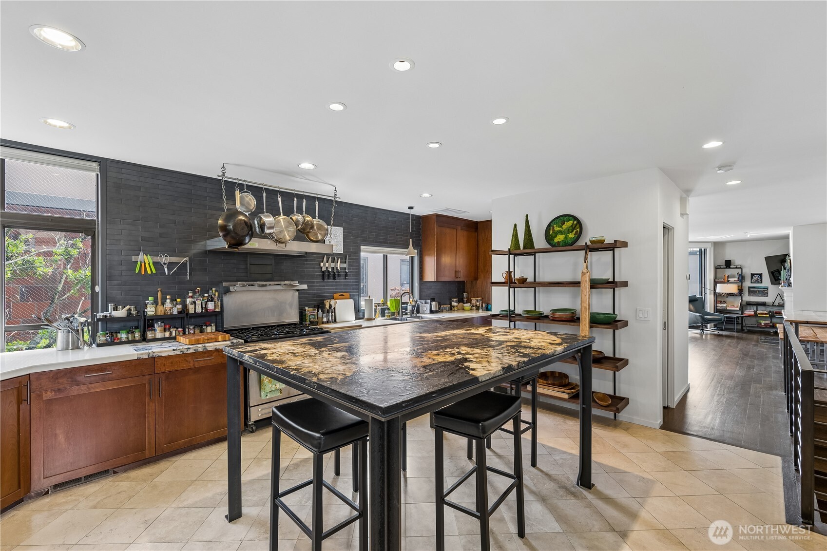 88 Virginia Street, Unit 2 Seattle, WA 98121 - Photo 5 of 20 a kitchen with a table and chairs in it