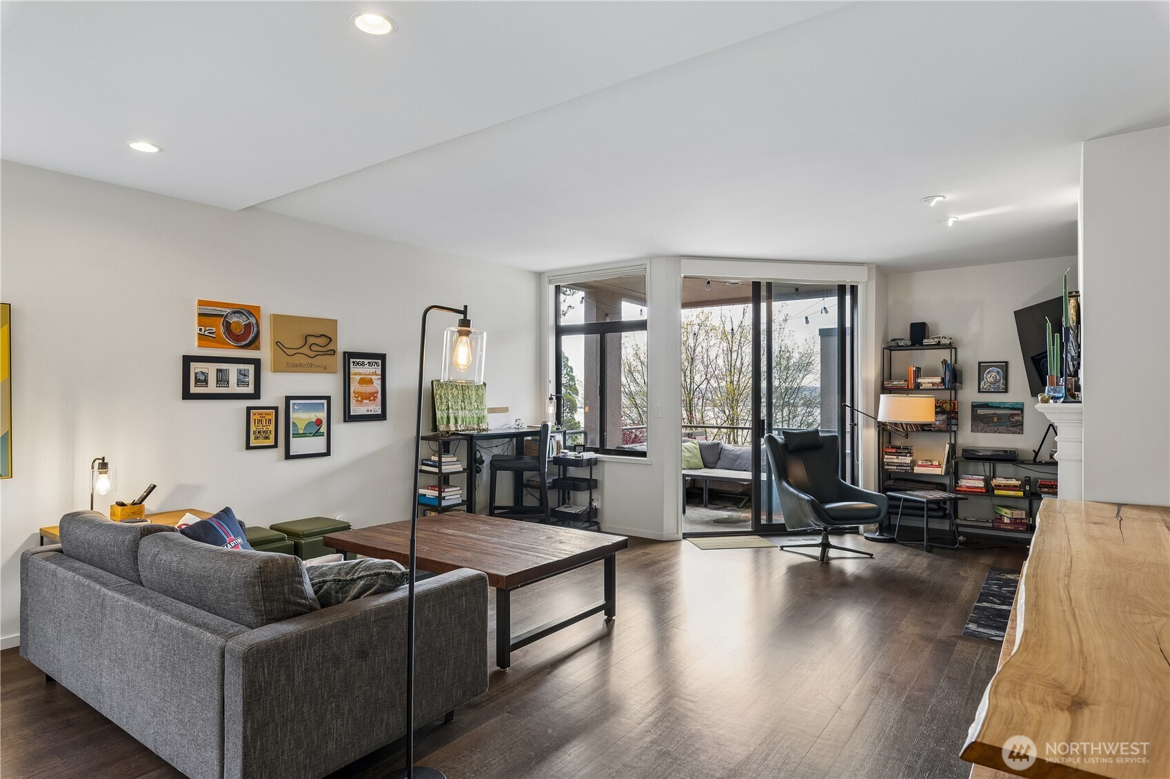 88 Virginia Street, Unit 2 Seattle, WA 98121 - Photo 9 of 20 a living room with furniture gym equipment and a large window