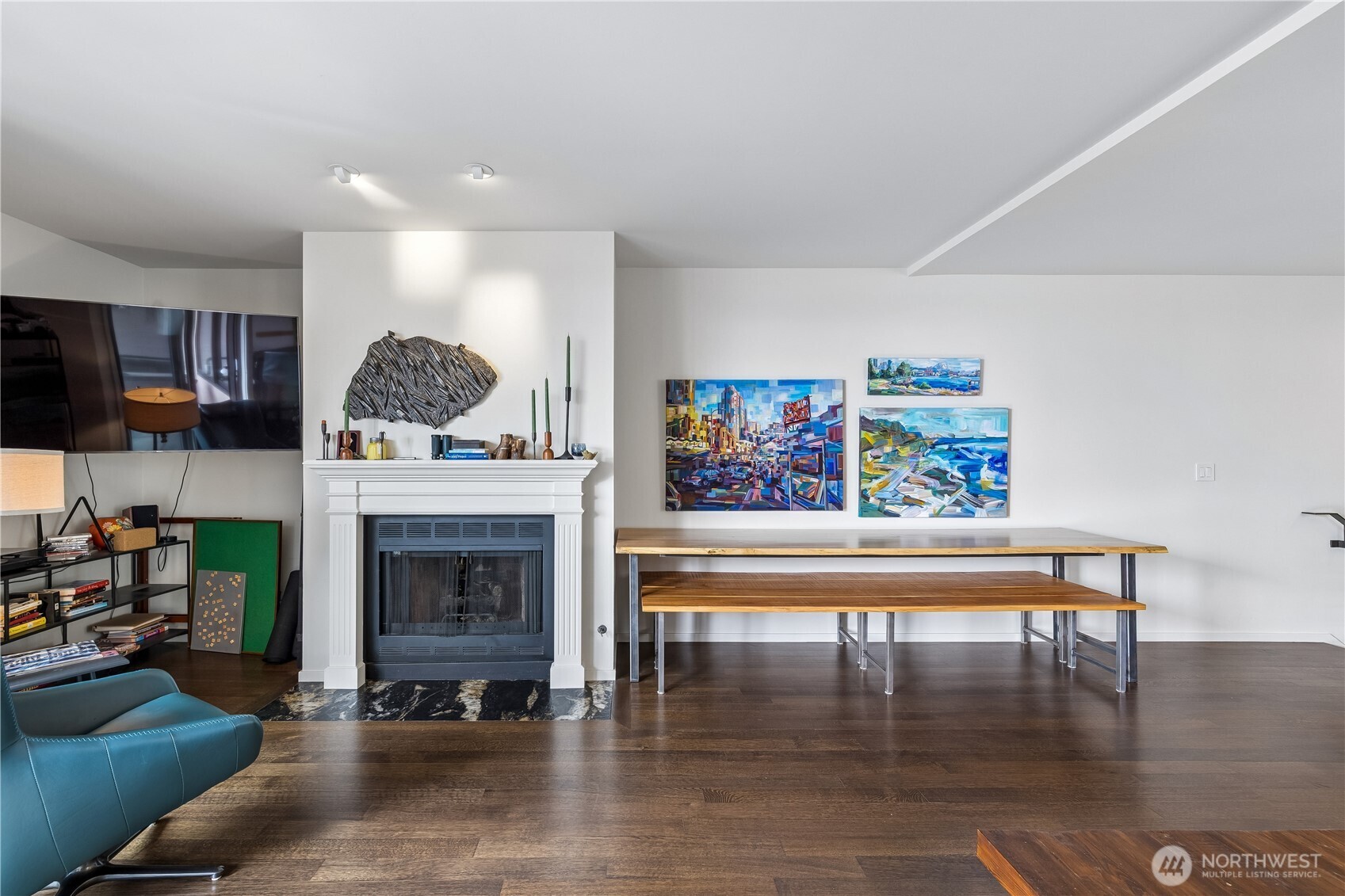 88 Virginia Street, Unit 2 Seattle, WA 98121 - Photo 10 of 20 a living room with furniture a fireplace and a flat screen tv