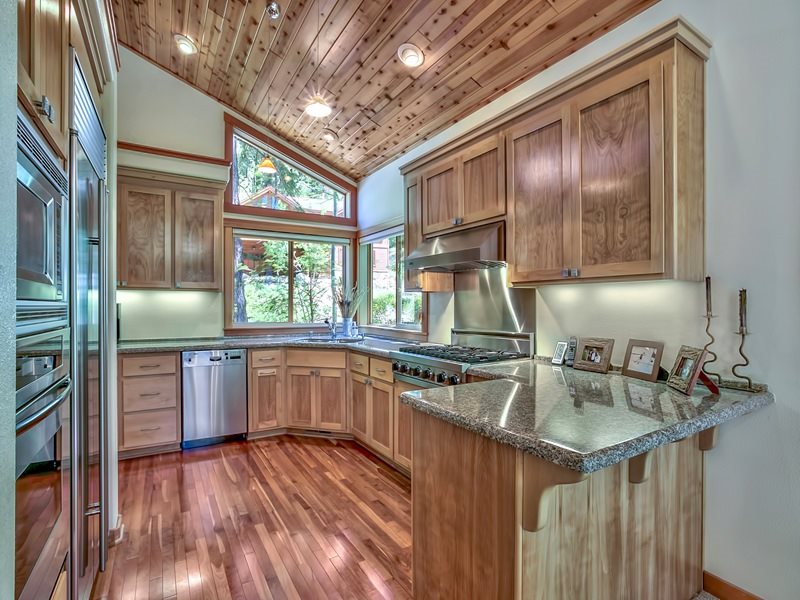 1018 Snow Crest Road Alpine Meadows, CA 96146 - Photo 3 of 14 a kitchen that has a sink a stove and wooden floor