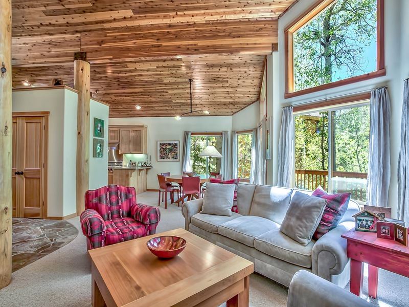 1018 Snow Crest Road Alpine Meadows, CA 96146 - Photo 6 of 14 a living room with furniture and a large window